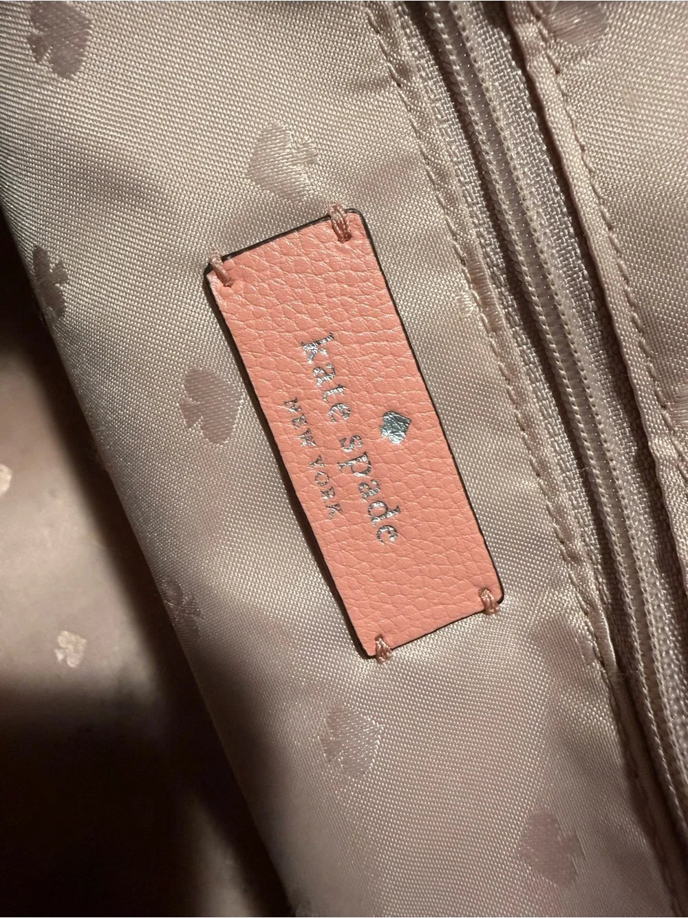 Kate Spade shoulder bag with crossbody strap.